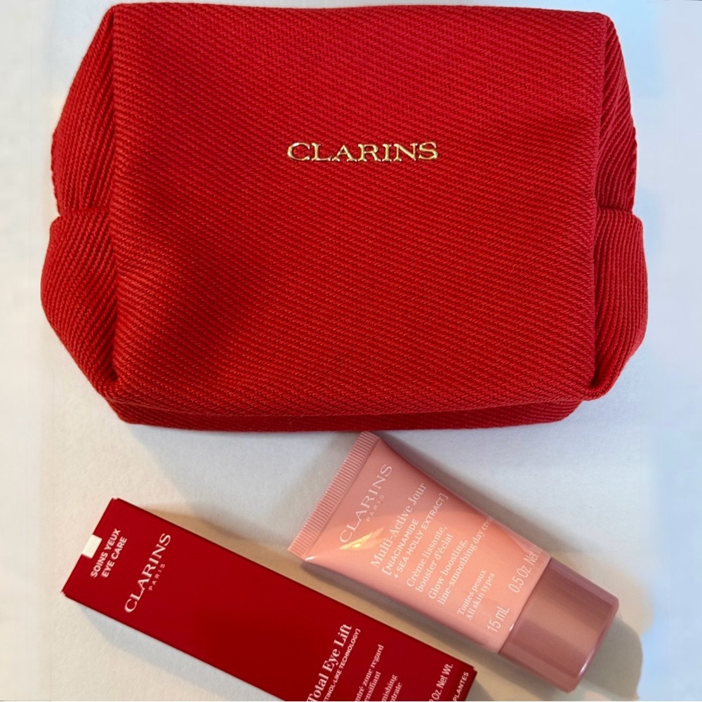Clarins. NEW! 1 moisturizer (15 ml), 1 eye cream (7ml), + 1 Cosmetic case.